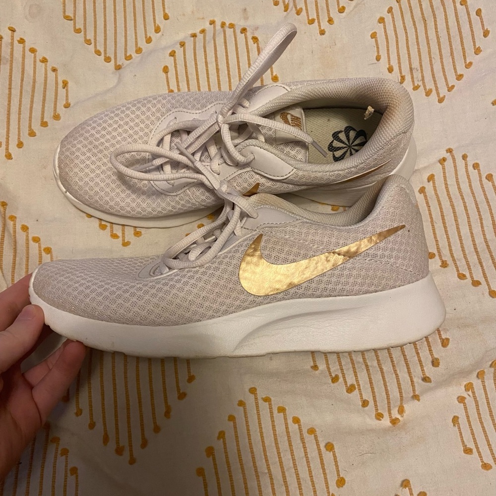 Nike Light Beige Sneakers with Gold Swoosh